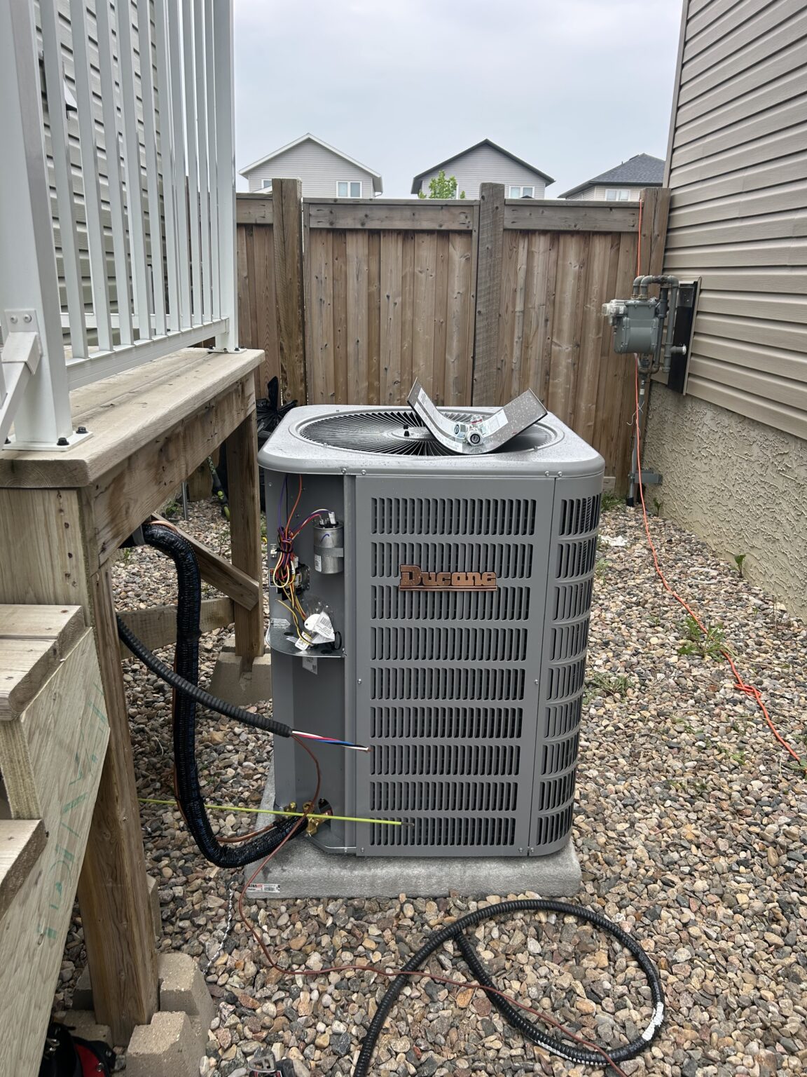 Residential Ducane air conditioner installation completed by Fire & Frost Mechanical in Saskatoon, Saskatchewan